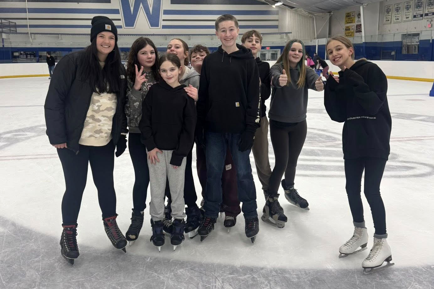 Students at ice rink during field trip