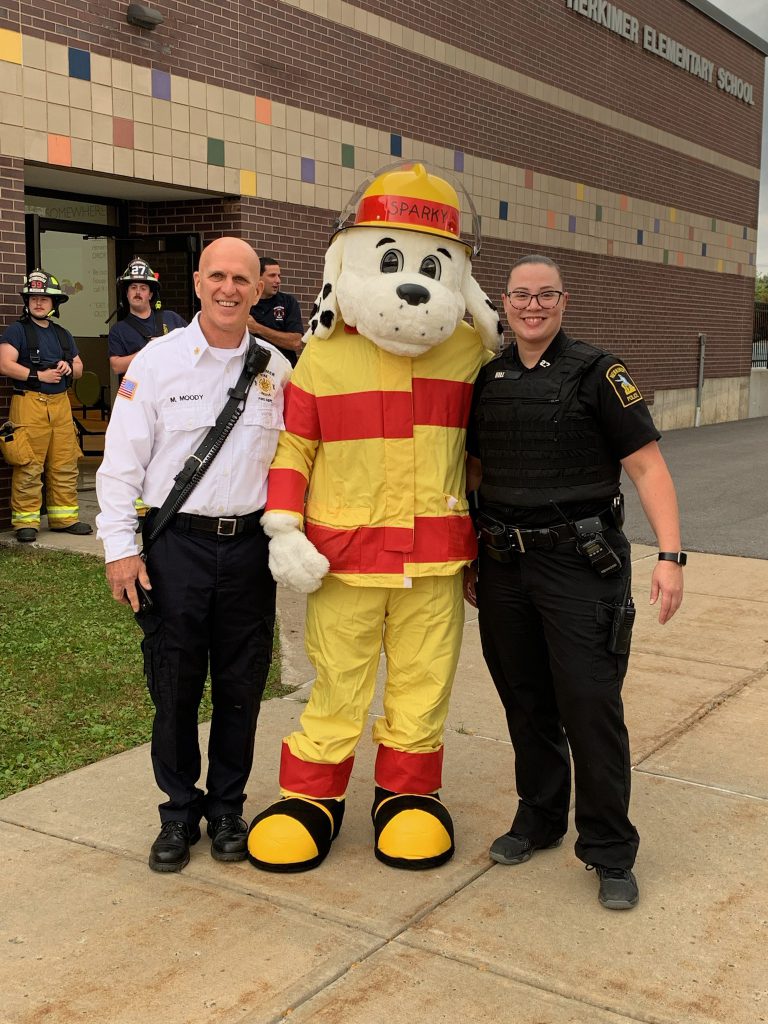 Posing with Sparky the Fire Dog