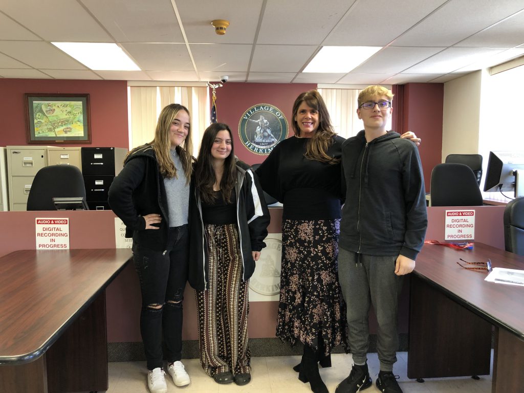 Three Herkimer civics students meeting with Herkimer Mayor Dana Sherry