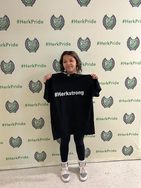 Student Havonna White holding up a #HerkStrong t-shirt