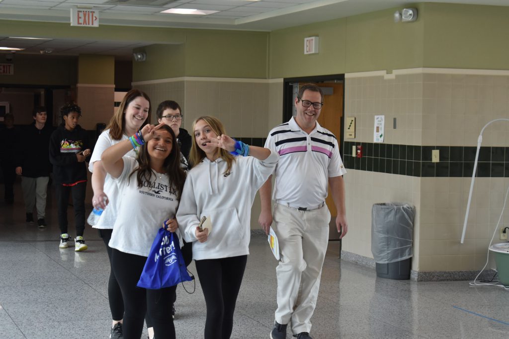Students and staff walking through the hallways for a mental health walk
