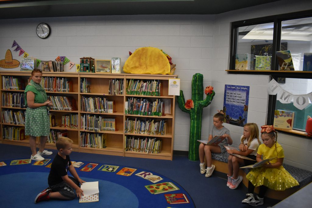 Elementary library students and teacher