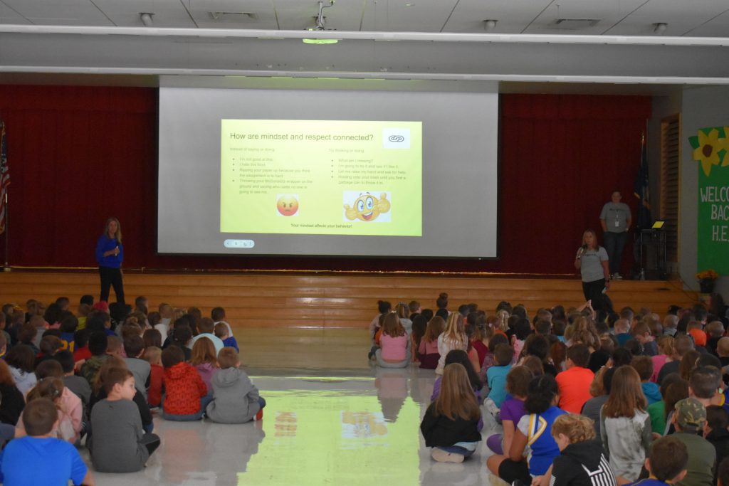 Renee Vogt and Cristi Paragi speaking at Respect Assembly