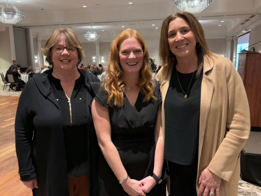 Heather McCutcheon holding Art Educator of the Year Award with Mary Tomaso and Kathleen Carney