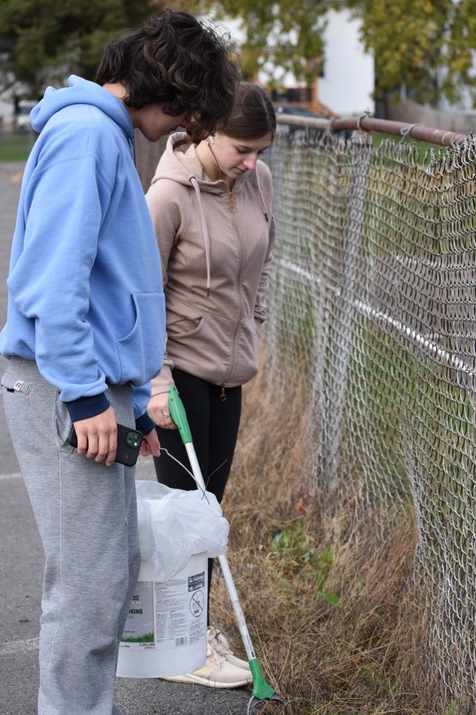 Students picking up litter at Harmon Park