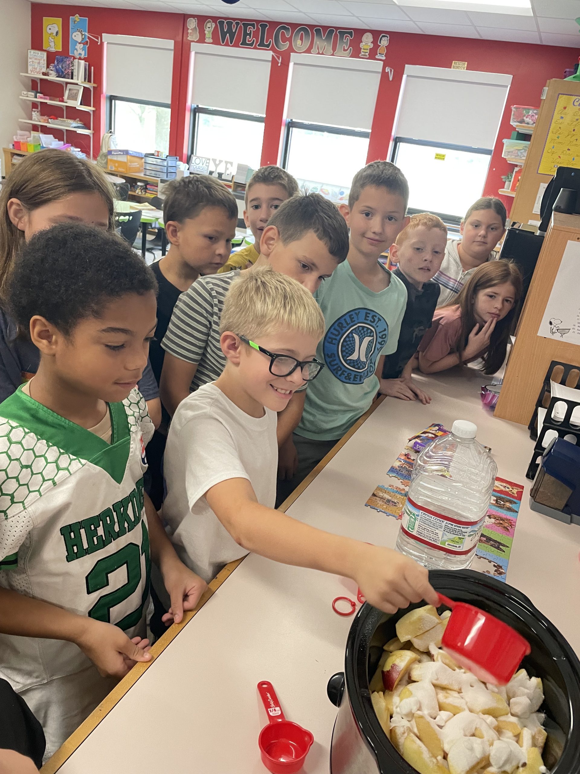 Fourth graders cooking in class