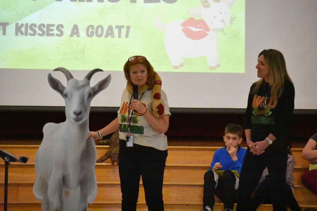Library Media Specialist Jennifer Olds and Principal Renee Vogt and a cutout of a goat