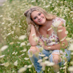 Isabella Maass in a field of flowers