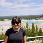 Samantha Vezza outside by trees and water