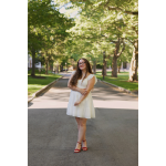 Alisa Labuz outside with trees behind her