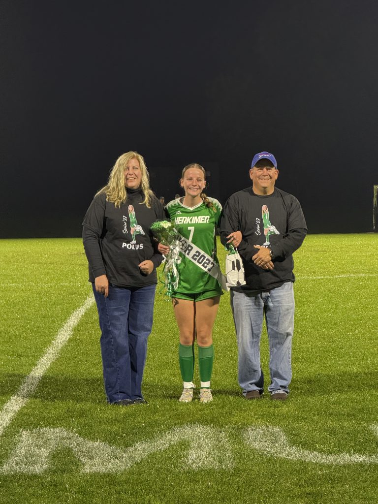 Girls soccer senior with family