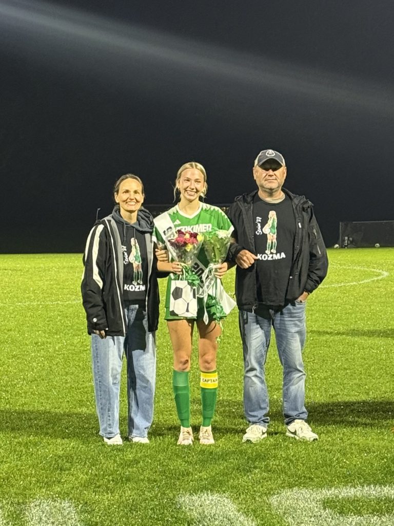 Girls soccer senior with family